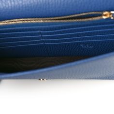 This is an authentic GUCCI Dollar Calfskin Interlocking G Chain Wallet in Caspian. This clutch wallet is crafted of textured calfskin leather in blue and features a front flap with a polished light gold interlocking GG Gucci logo and an optional crossbody strap. The front flap opens to a matching blue leather and black fabric interior with a zippered compartment, card slots, and patch pockets. Gucci Clutch, Gucci Crossbody Bag, Gucci Crossbody, Gucci Logo, Gucci Monogram, Chain Wallet, Gucci Shoulder Bag, Gucci Wallet, Wallet Fashion