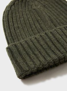 Here at Neem we‚ agree, that if you're going to go with a beanie or hat, pick one that's loose-fitting, lightweight, and made of soft, silky cashmere that way, it won't flatten your hair. Made in Germany to our exacting standards. This Olive Neem beanie hat‚ is knitted from superfine cashmere that's lightweight yet insulating. Made from biodegradable fibres and a beanie that is simply warming, soft, comfortable and worth investing in. Ribbed Wool Hat For Fall, Fall Ribbed Wool Hat, Ribbed Beanie Hats For Fall, Ribbed Beanie For Fall, Casual Wool Ribbed Beanie, Casual Ribbed Wool Beanie, Warm Casual Merino Wool Hat, Everyday Solid Ribbed Hat, Classic Ribbed Hat For Cold Weather