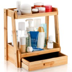 PRICES MAY VARY. Package Info: You will get a 2-tier bamboo makeup organizer with drawer after assembly. Keep your makeup essentials organized and easy to find. Premium Material: Made from 100% natural bamboo, durable and sturdy in use. Surface was polished smooth for not scratching your hands. With chic bamboo color, add a sense of elegance to your countertop or dressing table. Multipurpose Organizer: Versatile for kitchen spices, small jars, office supplies, and household items, also a great g Makeup Organization Bathroom Counter, Organize Bathroom Counter, Makeup Organizer Bathroom, Makeup Organization Bathroom, Bathroom Counter Organizer, Counter Organizer, Bamboo Makeup, Bathroom Counter Organization, Makeup Stand