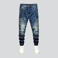 The 2023 Autumn-Winter Collection brings you the ultimate blend of vintage style and modern functionality with these mid-waist smoothed motorcycle jeans. Featuring slim fit silhouettes, medium wash, sanded, whiskered, biker, side-zippers, zipper & button closure, and stretchy fabric, these jeans are the perfect way to make a statement. Dare to be different and make heads turn with this distinctive biker style! Vintage Style: A traditional biker style for those who crave the vintage look. Medium Distressed Fitted Straight Leg Cargo Jeans, Fitted Distressed Straight Leg Cargo Jeans, Fitted Straight Leg Distressed Cargo Jeans, Trendy Dark Wash Jeans With Zip Fly, Urban Straight Leg Winter Jeans, Urban Straight Leg Jeans For Winter, Urban Fitted Cargo Jeans With Five Pockets, Fitted Rigid Denim Cargo Jeans With Five Pockets, Fitted Cargo Jeans With Five Pockets