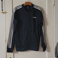 Nwt Adidas Jacket Cotton Outerwear With Three Stripes For Fall, Adidas Navy Outerwear For Fall, Adidas Cotton Outerwear With Ribbed Cuffs, Casual Navy Adidas Outerwear, Adidas Navy Outerwear For Winter, Navy Long Sleeve Track Jacket For Spring, Adidas Outerwear With Three Stripes For Fall, Adidas Three Stripes Spring Outerwear, Casual Adidas Navy Track Jacket