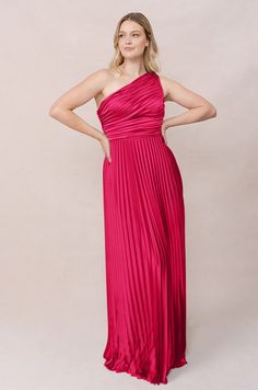 Model: Sydney; Size: 10; Color: Hot Pink Satin Pleated Dress, Pleated Satin Dress, One Shoulder Neckline, Empire Waistline, It Is Finished, Flowing Skirt, Bra Cups, Dress Backs, Pleated Dress