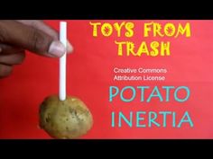 a potato sitting on top of a stick with the words toys from trash above it