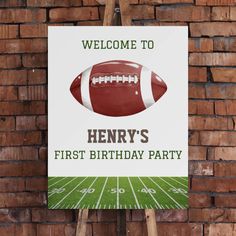 a sign that says welcome to henry's first birthday party with a football on it