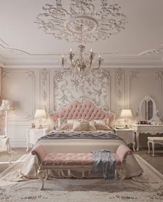 an elegant bedroom with pink furniture and chandelier