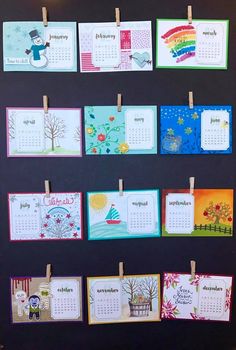 a bulletin board with calendars hanging on clothes pins