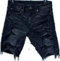 Black Knee-length Shorts For Spring, Edgy Black Short Length Bottoms, Edgy Black Short Leg Bottoms, Edgy Black Bottoms With Short Leg, Black Cotton Jean Shorts, Edgy Black Bottoms With Built-in Shorts, Black Cotton Knee-length Jean Shorts, Fitted Black Jean Shorts, Black Bermuda Bottoms For Streetwear