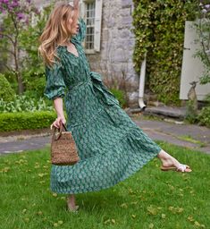 Perfect for a garden party, our Green Block Print Emma Dress features a feminine blue floral and green print. We adore this shade of green which was inspired by the gardens in the Hudson Valley. Worn belted for a fitted look, or loose and full for a caftan feel, the Emma is timeless and flirty. 100% Cotton. Made in India. Please note that the Emma runs true to size and has a loose fit with a belt to add shape. We suggest ordering a size down if you prefer a slimmer fit. Green Block Print, New Green, Green Print, Hudson Valley, Shades Of Green, Garden Party, A Garden, Blue Floral, Block Print