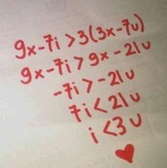 the numbers are written in red ink on a sheet of paper that has hearts drawn on it