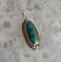 "Jewelry Rescue Sterling Silver Turquoise  Vintage Oval Pendant 30mm This is a special piece with nice real old turquoise stone and intricate design.  Very nice quality and great condition. 30mm with jump ring x 11mm x5mm It is  not stamped ,guaranteed to be sterling silver.  Comes  on rubber cord or sterling chain..5th photo shows similar piece on rubber cord and shows  clasp. I really like these rubber cords. They are inexpensive,sturdy and easy to get on and off. Available in 16\" and 18\" Pa Artisan Turquoise Oval Pendant Jewelry, Artisan Turquoise Oval Pendant Necklace, Handmade Turquoise Necklace With Oval Pendant, Bohemian Turquoise Oval Pendant For Jewelry Making, Engraved Bohemian Turquoise Ring, Bohemian Engraved Turquoise Ring For Gift, Bohemian Turquoise Oval Pendant Jewelry, Bohemian Turquoise Necklace With Oval Pendant, Bohemian Turquoise Oval Pendant Necklace Gift