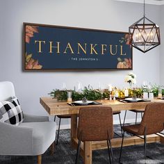 a dining room table with chairs and a sign that says, thank you for the donations