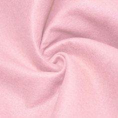 a close up view of a pink fabric