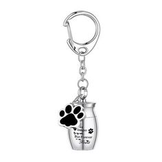 Description: Introducing our reliable and sturdy dog ash keepsake key holder made of high-quality alloy. With a smooth surface and edges, it is waterproof, strong, and wear-resistant, ensuring that it can be stored for a long time without breaking, rusting, or deforming. The elegant design of the dog urn keychain makes it easy to clamp onto your house keys, purse, handbag, or backpack, making it portable and not easy to lose. The pendant decoration of the dog paw adds a beautiful and cute touch, Dog Paw Pendant, Dog Ashes, Pet Cremation Jewelry, Paw Pendant, Puppy Paw, Dog Urns, Mini Dog, Pet Urn, Paw Pattern