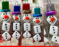 four different images of snowmen with hats and scarves on their heads, one in the process of making a snowman out of dices