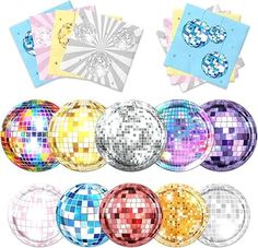 disco balls and napkins are arranged on a white background with different colors, shapes and sizes