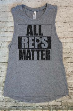 This All REPS Matter Workout Tank Top is desi9ned for that special athlete who can always find a way to get just ONE MORE rep in her workout because surely everyone who WODs knows, all reps matter! Don't just sweat those reps out in your next workout, SPARKLE with the white or black glitter text in this fun and inspirational tank top. ---------------------------------------------------------------------------------------------- Care Instructions: Machine wash in cold water. Air dry recommended o Athletic Heather Workout Tops For Sports Season, Athletic Heather Top For Workout And Sports Season, Gray Workout Tops For Sports Season, Athletic Heather Tops For Gym, Team Spirit Workout Tops For Sports Season, Cotton Sports Tops With Sweat Resistance, Cotton Sports Tops Sweat Resistant, Gray Sweat Resistant Tops For Sports Season, Gray Sweat Resistant Top For Sports Season