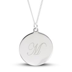 Bring Personalized panache to any look with this simple yet chic engravable disc pendant in silver. Fashioned in sterling silver This small round disc showcases your single initial - inscribed in an artful cursive font at the center. The pendant suspends along an 18.0-inch curb chain that secures with a spring-ring clasp. Classic Round Initial Necklace For Anniversary, Classic Round Initial Necklace For Personalized Gift, Classic Round Pendant Initial Necklace For Anniversary, Classic Sterling Silver Monogram Necklace, Classic Round Disc Jewelry With Initials, Classic Round Pendant Initial Necklace, Classic Monogram Medallion Jewelry, Classic Initial Necklace With Round Pendant For Personalized Gift, Sterling Silver Monogram Round Disc Jewelry