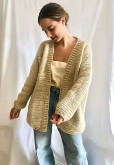 This Oversized cardigan, has a gorgeous V neckline and is 100% handmade. This wool cardigan has a beautiful open clousure. This amazing oversize cardigan is the gargment that you would want wear it forever! Perfect to wear it with dresses or with a jean! Super comfortable, stylish and versatile! WHICH IS MY SIZE? This cardigan is One size fits all (S-L).  If you are not sure if it fits you, here you have the measurements of the back and the lenght. The width from shoulder to shoulder is 55 cm/21,6 in and length 75 cm/29,5 in.  If you can't find your size or you are not sure about the size, contact me and I will make the one that fits your measurements. HOW TO KEEP YOUR CARDIGAN PERFECT: In order to keep your oversize cardigan as a brand new one follow the next recommendation. You can  wash Beige Crochet Knit Cardigan, Beige Cozy Open Knit Cardigan, Cozy Beige Open Knit Cardigan, Cozy Cream Crochet Sweater, Beige Crochet Knit Outerwear, Cream Crochet Cardigan For Fall, Crochet Cream Cardigan For Fall, Fall Crochet Cream Cardigan, Fall Cream Crochet Cardigan