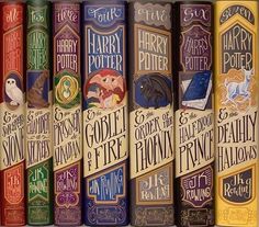 several harry potter books lined up on a shelf