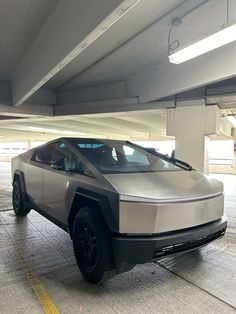 an electric car parked in a parking garage