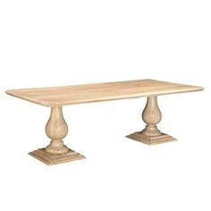 a wooden table with two pedestals on each side