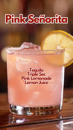 a pink lemonade drink in a glass on a table