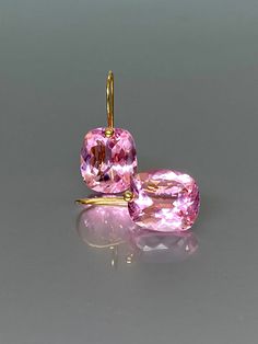 Gorgeous sparkly pink topaz drop earrings. The Faceted oval drops are flawless and reflect lights beautifully. The fancy facets drops attached to24k gold vermeil/14K SOLID GOLD ear wires. The earrings are elegant and have a lux look. A truly gorgeous pair of earrings. When 14K SOLID GOLD ear wires are being used, the ear wire ends are hand stamped as proof of being 14K solid gold. In addition, extra work was done at the end of the ear wires to prevent any sort of pain or injury while inserting t Pink Topaz Jewelry, Pink Stone Earrings, Chanel Stud Earrings, Pink Topaz Earrings, Pink Topaz Ring, Ruby Earrings Studs, Topaz Jewelry, Birthstone Earrings, Pink Topaz