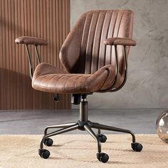 a brown office chair sitting on top of a rug