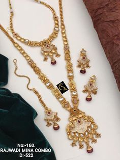 Description :- Exclusive Wedding Necklace Sets Antique Gold-Plated Indian Jewelry Set with Long Necklace and Earrings The biggest highlight of this manalis Myra necklace set lies in its detailing. The designers at Tarinika have put meticulous attention to details in order to perfect the detailing of the unique and intricate design. The bead-like design of the necklace's chain fuses ethnic style with contemporary flairs. 100% Satisfaction Guarantee: 1 Year Warranty, Long Lasting Plating, High-Qua Indian Jewelry Set, Wedding Necklace Set, South Indian Jewelry, Indian Jewelry Sets, Necklace Sets, Choker Necklace Set, Exclusive Wedding, Fancy Jewellery, Wedding Jewellery Necklace