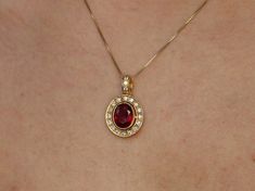 Antique Ruby Pendant set with a Created Ruby in perfect diamond cut, flawless clarity & deep red color, at 10x8mm, 3 Carats, surrounded by CZ Diamonds.Red Vintage Pendant design made of Gold Vermeil ☞ thickest 18k Gold Plating on top of Solid 925 Sterling Silver ☞ made to last.Matching Ring: www.etsy.com/listing/761089210Matching Earrings: www.etsy.com/listing/963504392Free Vermeil Chain with every Pendant order, 18 inch Silver chain (46 cm) ✓Details : ♥ Each item comes in a cute GIFT BOX ✓♥ Red Oval Diamond Jewelry, Red Oval Diamond Cut Necklace, Red Oval Necklace For Formal Occasions, Red Oval Necklaces For Formal Occasions, Red Oval Necklace For Anniversary, Oval Red Necklace For Anniversary, Pretty Crowns, Ruby Necklace Gold, Ruby Pendant Set