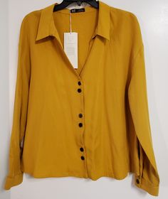 Zara Mustard Yellow Top New With Tag Size Xl 22 Inches Pit To Pit Casual Yellow Office Shirt, Gold Trendy Button-up Top, Trendy Gold Button-up Top, Gold Shirt With Buttons For Fall, Yellow Tops For Workwear In Fall, Casual Yellow Office Blouse, Yellow Tops For Fall Workwear, Yellow Summer Office Shirt, Yellow Long Sleeve Office Tops