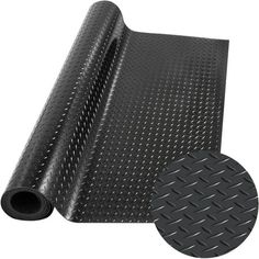 black diamond plated vinyl sheet with white dots on the side and one roll in front