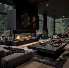 a living room filled with furniture and a fire place in the middle of it's walls