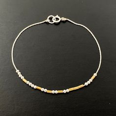 "This Morse code bracelet have beads floating on a delicate specialty chain. The mixed metal beads form a sophisticated, modern design. It is a subtle way to send your love message. Also a perfect daily reminder for love, inspiration, and mental health. ❤️ Matching morse code necklace: https://etsy.me/31Vv2Qm ∙ ∙ ∙ ∙ ∙ ∙ ∙ ∙ ∙ ∙ ∙ ∙ ∙ ∙ ∙ ∙ ∙ ∙ ∙ ∙ ∙ ∙ ∙ ∙ ∙ ∙ ∙ ∙ ∙ ∙ ∙ ∙ ∙ ∙ ∙ ∙ ∙ FEATURES ▶ All materials are sterling silver and 14K gold filled. Hypoallergenic. Suitable for sensitive skin. ▶ Be Minimalist Adjustable Chain Bracelet With Gold Beads, Minimalist Adjustable Gold Beads Chain Bracelet, Adjustable Gold Sterling Silver Beaded Bracelets, Adjustable Gold Beaded Sterling Silver Bracelet, Minimalist Adjustable Gold Beaded Chain Bracelet, Adjustable Gold Beaded Bracelet With Satellite Chain, Dainty Adjustable Gold Sterling Silver Bracelet, Minimalist Gold Beaded Bracelet In Sterling Silver, Gold Sterling Silver Beaded Bracelets With Round Beads