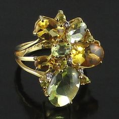 10k Yellow Gold Citrus Gemstone Ring - Size 5 - Stamped 10k - Made In Thailand - Measures 3/4" Long X 1/2" Wide This Is A Freeform Cluster Of Oval Brazilian Lime Quartz, Citrine, Sri Lanka Yellow Sapphires And Round Diamond Accents. Gold Gemstones Ring With Gemstone Accents, Gold Cluster Rings With Gemstone Accents, Yellow Multi-stone Round Gemstones, Gold Cluster Ring With Gemstone Accents, Yellow Gemstones With Accents Fine Jewelry, Gold Cluster Jewelry With Gemstone Accents, Yellow Gold Citrine Gemstones With Multi-stone Detail, 14k Yellow Gold Multi-stone Gemstones, 14k Gold Yellow Rings With Accent Stones