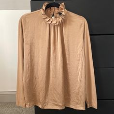 Nwot Banana Republic Camel Satin Blouse With High Neck Detail Camel Tops For Workwear In Fall, Camel Long Sleeve Tops For Spring, Beige Collared Single-breasted Top, Fitted Gold Button-up Blouse, Elegant Brown V-neck Blouse, Affordable Beige 3/4 Sleeve Blouse, Chic Satin Tie-neck Blouse, Satin Blouse, Banana Republic