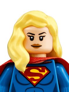 a close up of a lego figure wearing a superman suit with blonde hair and a moustache