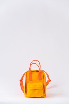 Raspberry Rucksack — SARAH KIRSTEN Orange Nylon School Bags, Orange Backpack With Zipper Closure, Functional Orange Travel Backpack, Functional Orange Backpack For Travel, Functional Orange Backpack For School, Orange Travel Backpack With Zipper Closure, Satchel-style Backpack With Zipper Pocket For School, Orange Bags For Everyday Use And Back To School, Orange Travel Bag For Back To School