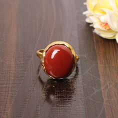 Natural Red Jasper Gemstone Ring, Brass Ring, Red Gemstone Ring, March Birthstone, Gold Plated Ring, Wedding Earing For Women, Gift For Her Description : Metal : Brass Plating : Gold Plated Gemstone : Natural Red Jasper Stone Size  : 14 x 12 MM Approx Weight : 4.16 Gram Approx ❣❣ Handmade Item ❣❣   **Made to Order** » G EM S T O N E D E T A I L « **Gemstone structure may vary from the image as two gemstones do not have the same structure** If you want to see the picture of gemstone, then feel free to contact us. » C U S T O M I Z E O R D E R « All gemstone jewelry is made with silver and brass. If you want to make any changes with this jewelry, then please send us a message. We will make as per your requirements. For more beautiful designs please visit our Etsy shop below: https://www.etsy Red Gemstone Ring, Red Jasper Stone, March Birthstone, Red Gemstones, Brass Ring, Plated Ring, Jasper Stone, Gold Plated Rings, Red Jasper