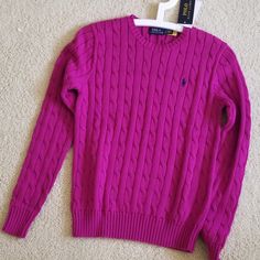 The Very Classic Look Of Rolo Ralph Lauren. 100% Cotton Cable Knit In Beautiful Magenta Color. Polo Logo At Upper Front Round Neckline Size Sp Nwt Purple Cable Knit Top For Fall, Fitted Purple Crew Neck Sweater, Classic Purple Winter Tops, Casual Purple Cable Knit Sweater, Magenta Sweater, Cotton Cable Knit Sweater, Pink Knit Sweater, Polo Logo, Ralph Lauren Tops