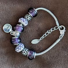 Charmed Links Silver-Tone Purple Beaded Bracelet With Gemini Charm (Removable). Thick Cable Chain With Removable Various Purple Charm Beads. Approximately 9 Inches Long. Excellent Condition. Never Worn. Purple Beaded Bracelets, Beaded Charm Bracelet, Charm Beads, Bead Charm Bracelet, Cable Chain, Charm Jewelry, Womens Jewelry Bracelets, Bead Charms, Beaded Bracelet