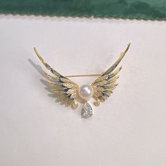 Rhinestone Angel's Wings Freshwater Pearl Brooch | Red Retro Jewelry Elegant Wing-shaped Jewelry Gift, Elegant Wing-shaped Jewelry As Gift, 17 Jewel Pendant Brooches For Gifts, Elegant Silver Enamel Pin For Parties, Elegant Silver Enamel Pin, Elegant Silver Enamel Pin Gift, Elegant White Enamel Pin For Gift, White Pendant Brooch Gift, Elegant Brooch Pins For Jewelry Making