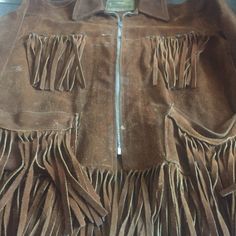 "Brown suede in good condition, circa 1970's with zipper front and plenty of fringe. Brass rivets with rich patina. Jacket has true vintage wear and hasn't been worn for many years. Size 14 in women's Model size women's small. 18\" armpit to armpit 16\" shoulder to shoulder 18\" sleeve 23\" collar to hem including fringe" Vintage Winter Leather Jacket With Fringe, Vintage Leather Jacket With Fringe For Winter, Vintage Fringe Leather Jacket For Winter, Vintage Brown Fringed Outerwear, Vintage Brown Fringe Outerwear, Vintage Jackets Women, Tacoma Wa, Small Photos, Glass Heart