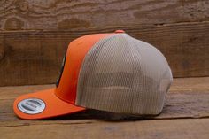 "Snap back Yupoong cap with \"Yosemite National Park\" Patch. One size fits all. Adjustable for hat sizes 6-5/8 to 7-5/8 The front panels are cotton, and the mesh back is polyester. Available in: Moss Green w/ Khaki Mesh Back Brown w/Khaki Mesh Back Orange w/Khaki Mesh Back" Outdoor Mesh Baseball Cap With Flat Brim, Fitted Trucker Baseball Cap With Flat Brim, Fitted Trucker Hat Snapback Style, Outdoor Mesh Hat With Flat Brim, Fitted Outdoor Cap, Fitted Trucker Hat With Flat Brim, Orange Trucker Baseball Cap One Size, Outdoor Baseball Cap With Mesh Back And Flat Brim, Trucker Hat With Flat Brim For Sports