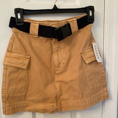 Pacsun Belted Cargo Mini Skirt. Color: Tan, Size: 24. New With Tags Never Worn!!! Belt Is Removable. Black Jean Skirt, Cargo Mini Skirt, Blue Denim Shirt, Tiered Mini Skirt, Distressed Denim Skirt, White Mini Skirt, Black Denim Skirt, Jean Mini Skirts, Floral Mini Skirt