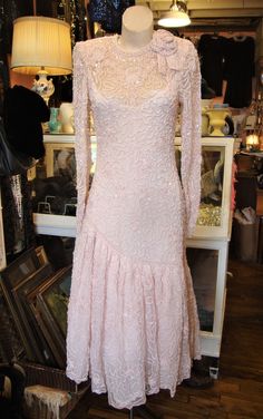 "This is a vintage light pink sequin and  beaded dress by Avenue Fashion from the '80's in a size XS.  It's fine netting, with all over braid, pearls, and  sequins.  The skirt has a double net flounce, one with a ruffle, to add pouf!  This dress is in great shape, no issues to report, just one pinhead size spot that I have not tried to remove. (see photos) Opens in the back with a well working invisible zipper, and small hooks and eyes. Has removable shoulder pads.  Comes from a smoke free home. Measurements:  Bust: 34\"   Waist:  26\"   Hip: 36\"   Across Shoulder:  14\"   Sleeve Length:  27\"   Length:  50\" Please ask me any questions you may have before buying as this is a final sale. Please know your measurements and allow for movement.  I ship within 3 business days of cleared paymen Vintage Pink Sequined Dresses, Pink Vintage Sequin Dress, Vintage Pink Sequin Dress, Beaded Party Dress, Prom Dresses Elegant, Evening Dresses Elegant, Pink Sequin, Wedding Veils, Fashion Lighting