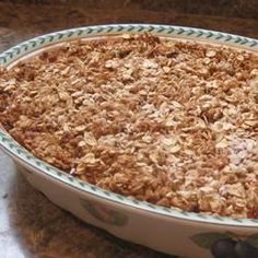 a casserole dish filled with oatmeal sitting on top of a counter