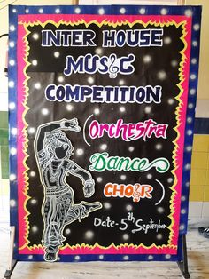 a sign advertising the international dance choir competition in front of a wall with lights on it