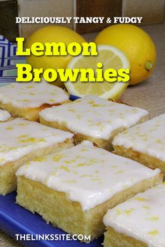 lemon brownies with icing on a blue plate