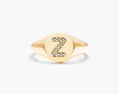 14K Yellow Gold Diamond Z Initial Signet Ring. This timeless ring will dazzle all who see it. Perfect for any age and occasion, this ring makes the perfect individualized gift! Gift Initial Ring With Diamond Accents, Classic Gold Initial Ring With Brilliant Cut, Round Cut Signet Ring With Diamond Accents For Gift, Personalized Yellow Gold Diamond Ring, Personalized Yellow Gold Diamond Ring, Round Cut, Personalized Yellow Gold Diamond Ring Round Cut, Fine Jewelry Signet Ring With Brilliant Cut As Gift, Gold Signet Ring With Brilliant Cut For Gift, Fine Jewelry Signet Ring With Brilliant Cut For Gift